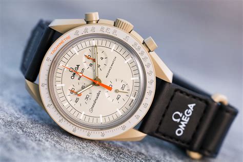 who made omega watches|does Swatch own omega.